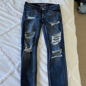 AE low rise super stretch distressed jeans